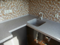 Столешница из искусственного камня с интегрированной мойкой 400х400 Grandex ST105, угловая